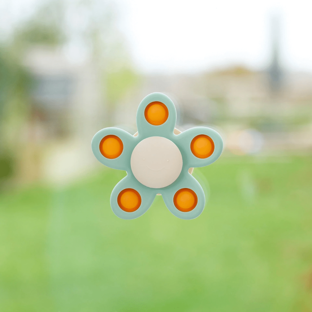SiliSoft Flower Spinner i mjuka färger - Tickit