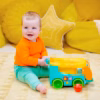 Pop and Roll Bright Starts Safari Bus Ball Play Toy – en färgglad safaribuss